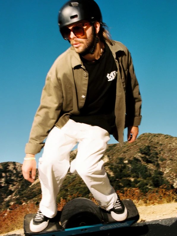 Bodhi Harrison riding a Onewheel