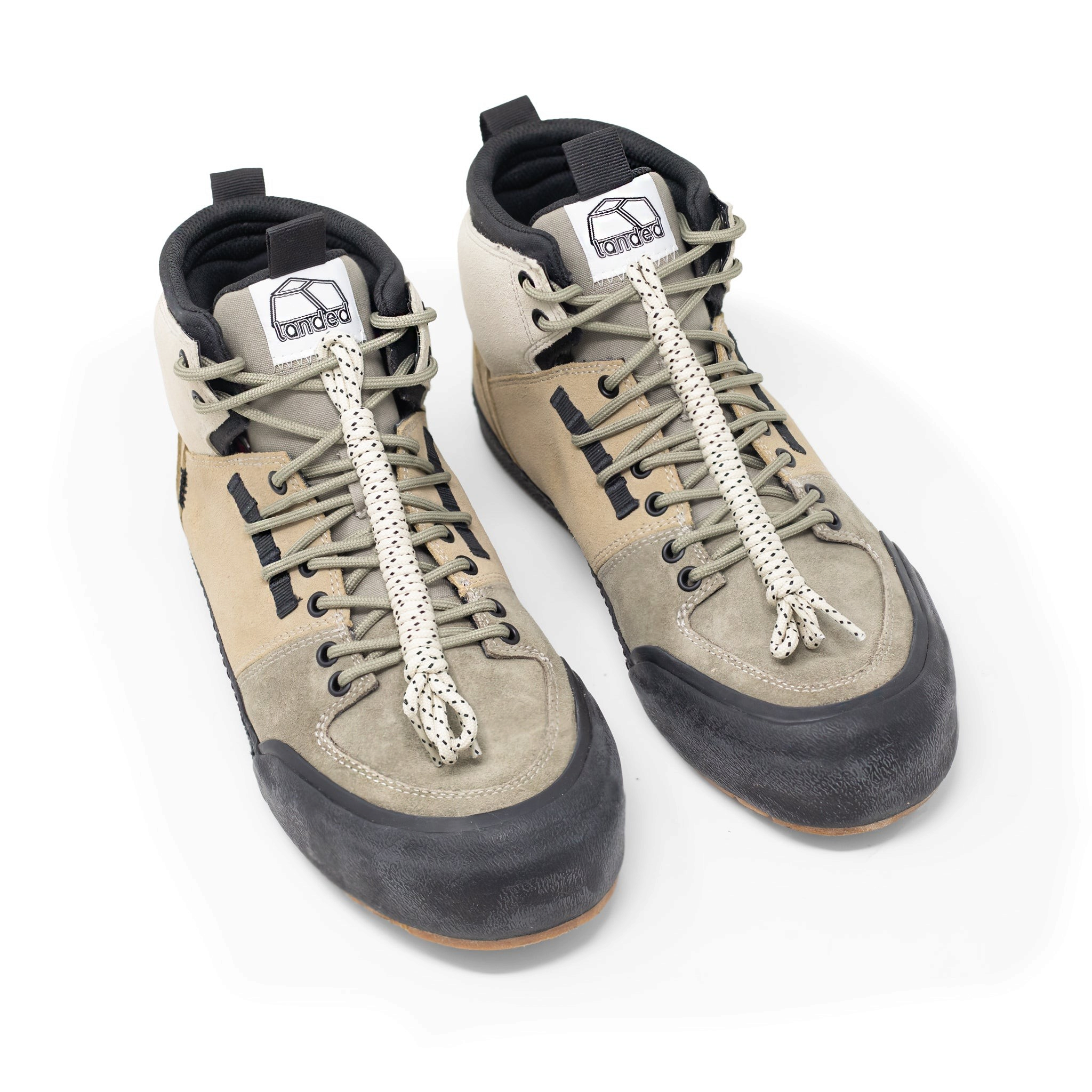 Landed The Elevate high-top performance sneakers in olive and beige suede with black rubber toe caps and rope laces.
