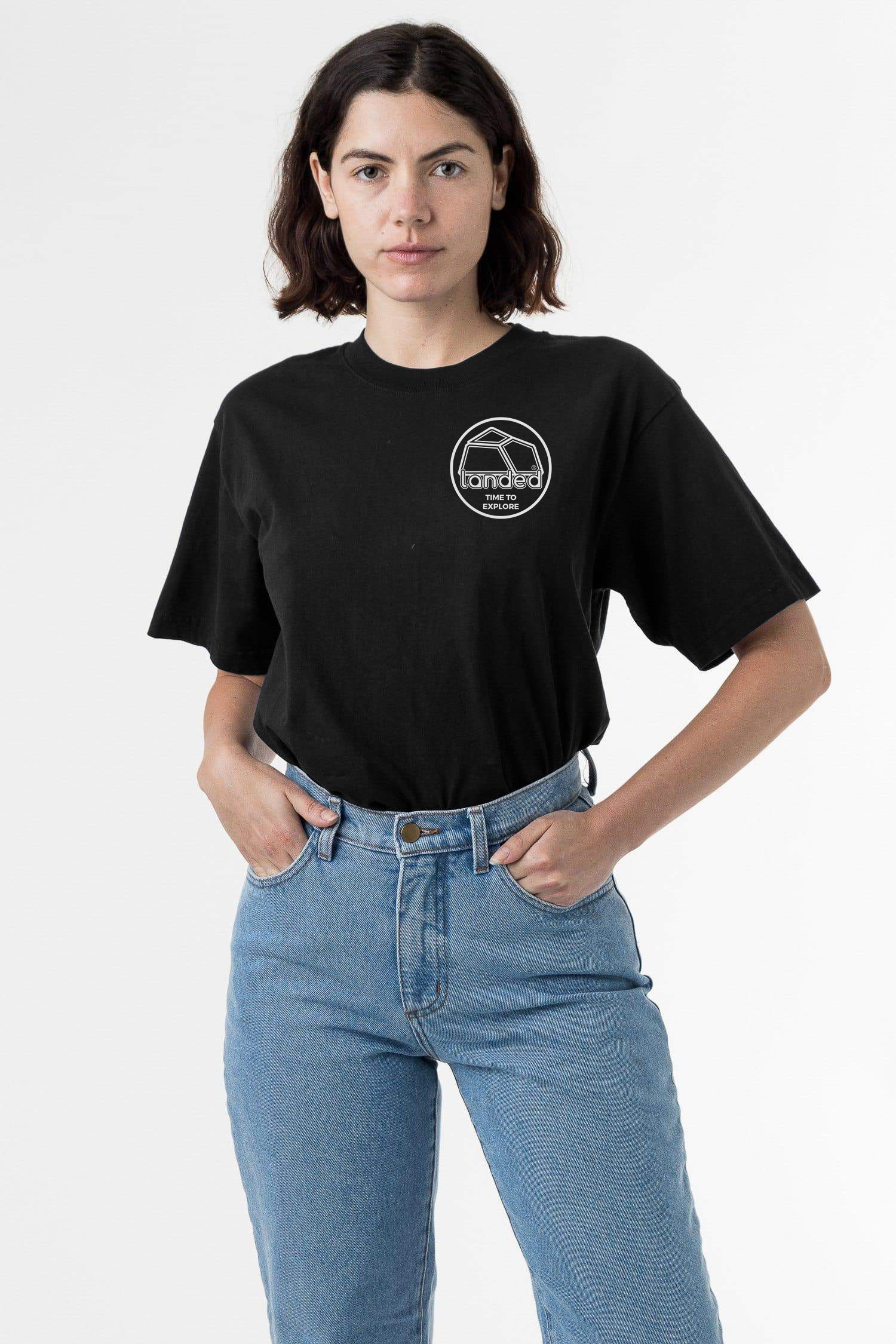 Landed Landmark heavyweight black cotton t-shirt with white embroidered logo on chest worn by a woman in blue jeans