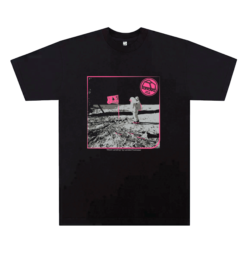 Landed black heavy-duty cotton t-shirt featuring a pink and white moon landing graphic print on the front.