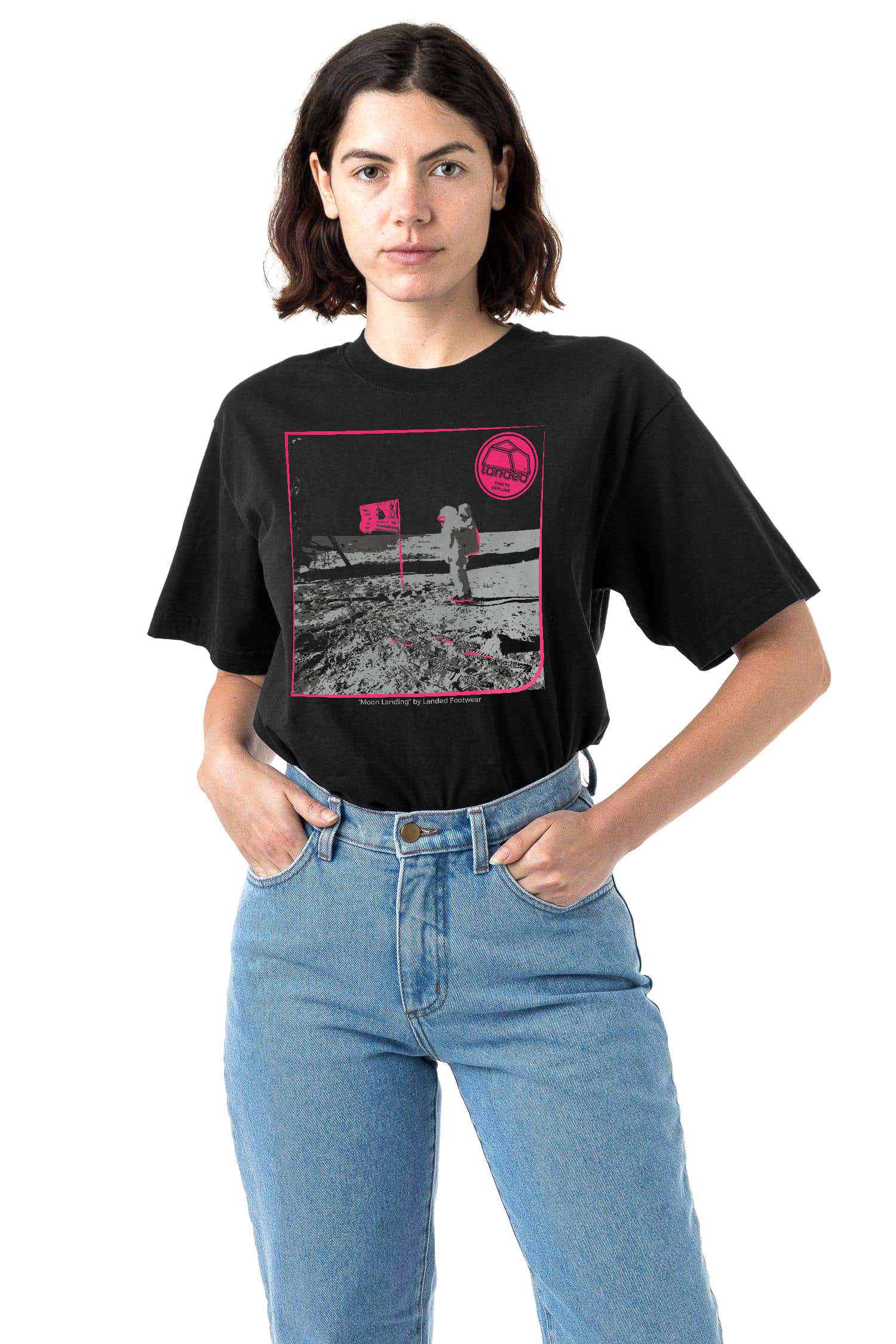 Landed black cotton t-shirt featuring a pink moon landing graphic print worn by a woman with light blue denim jeans