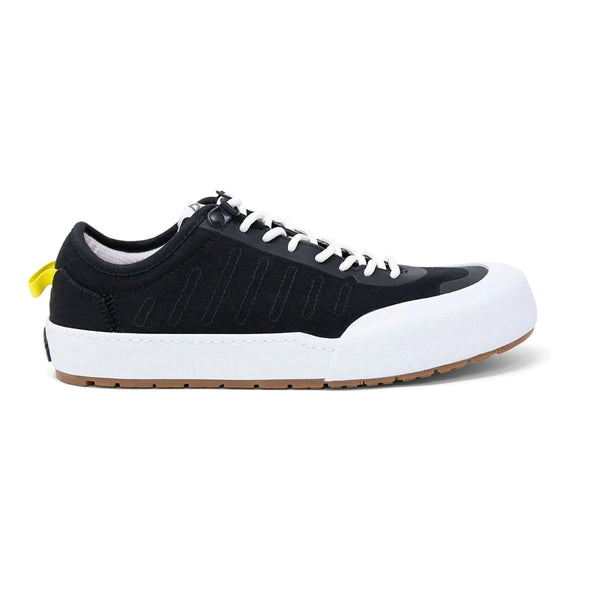 Landed The Overlook 1.0 black technical sneaker with white rubber toe cap, white laces, and yellow heel pull tab. - Black Note