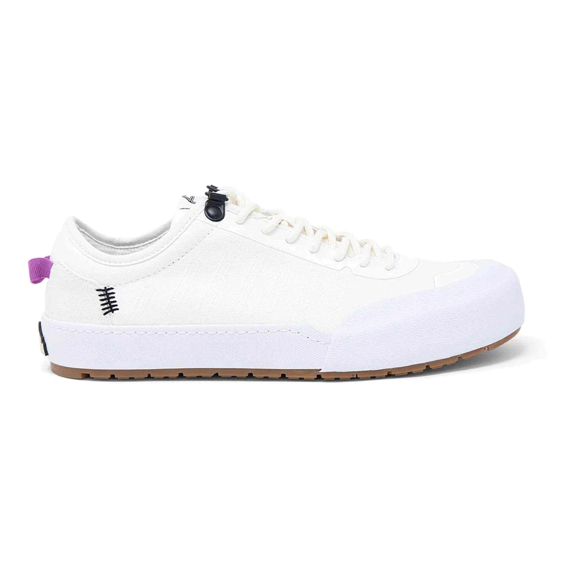Landed The Overlook 1.0 white technical sneaker with a gum rubber sole and purple heel pull tab