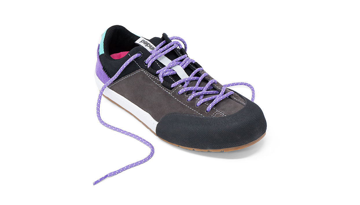 Landed The Switchback approach shoe in grey suede with purple laces, black rubber toe cap, and gum sole.