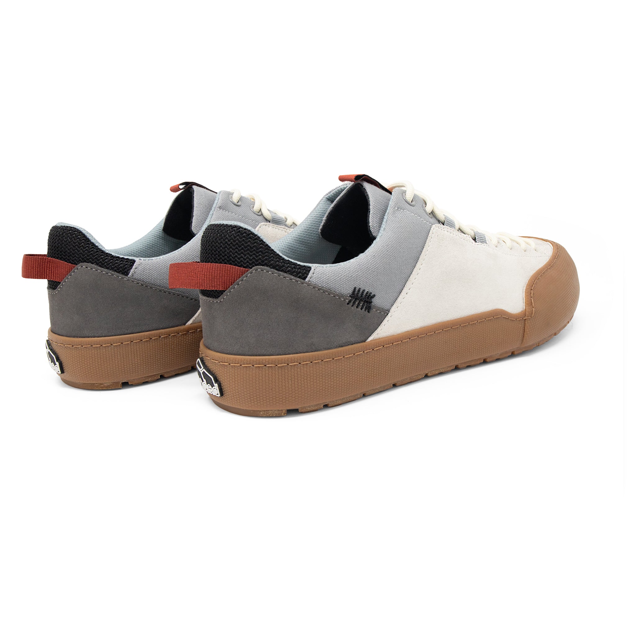 Landed The Switchback sneakers in grey and off-white suede with a gum rubber sole and rear pull tabs