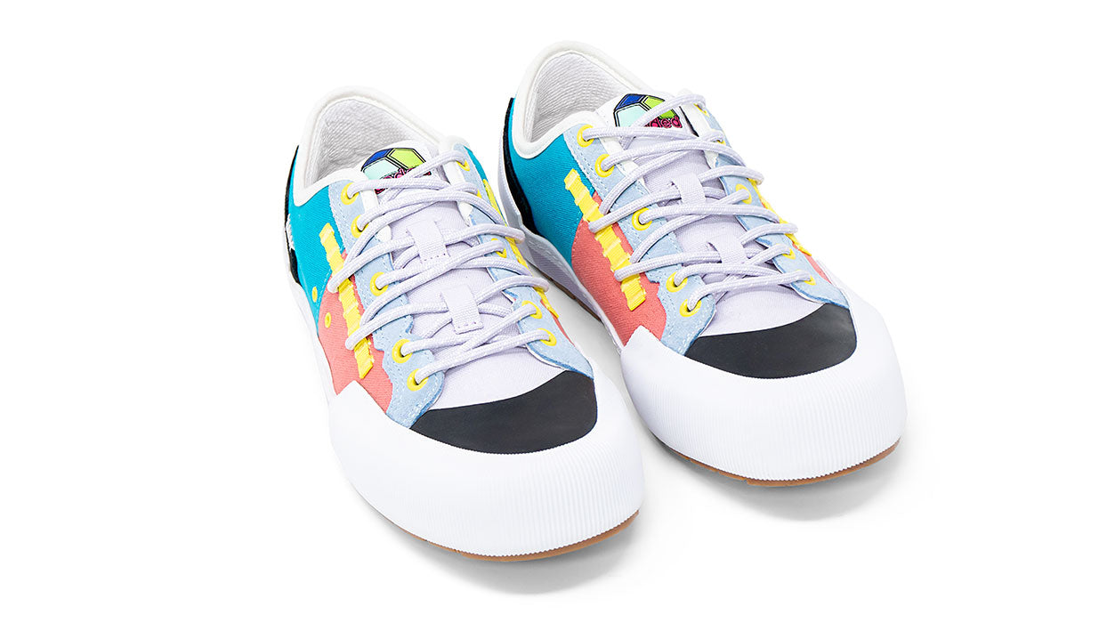 Landed The Banner sneakers featuring a multi-colored technical design with white, blue, pink, and black accents.