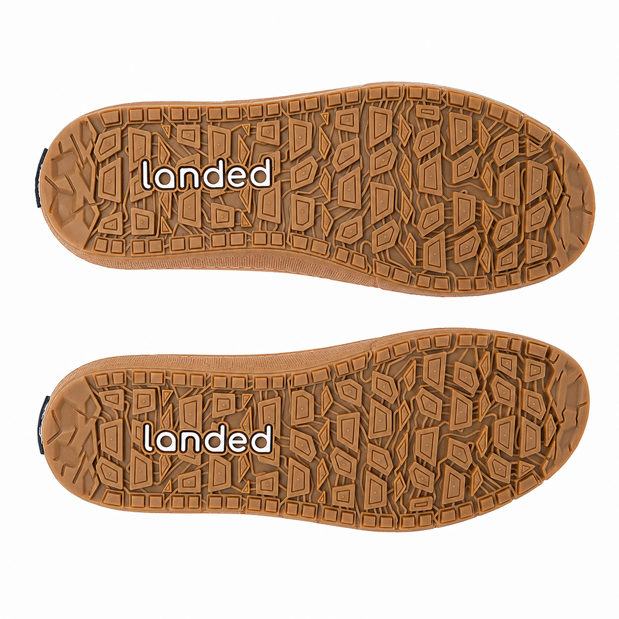 Landed The Elevate high-top shoe outsoles featuring a durable gum rubber tread pattern and branded logo