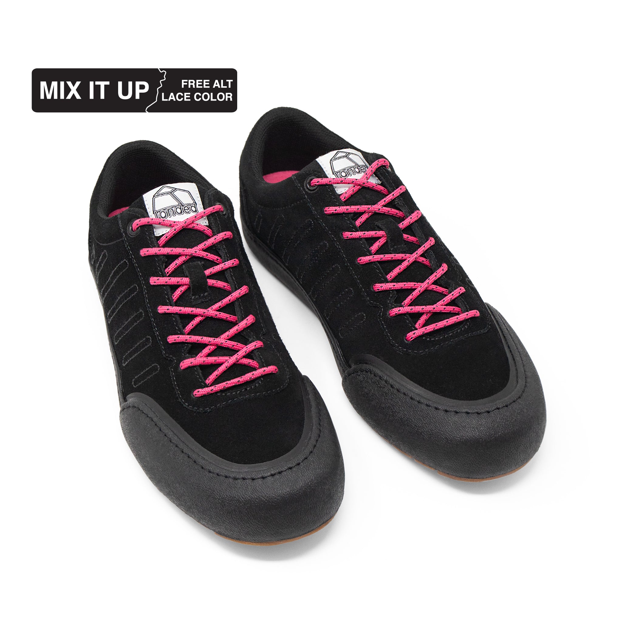 Landed The Overlook 2.0 black technical sneakers with pink laces, featuring a durable rubber toe cap and suede upper.