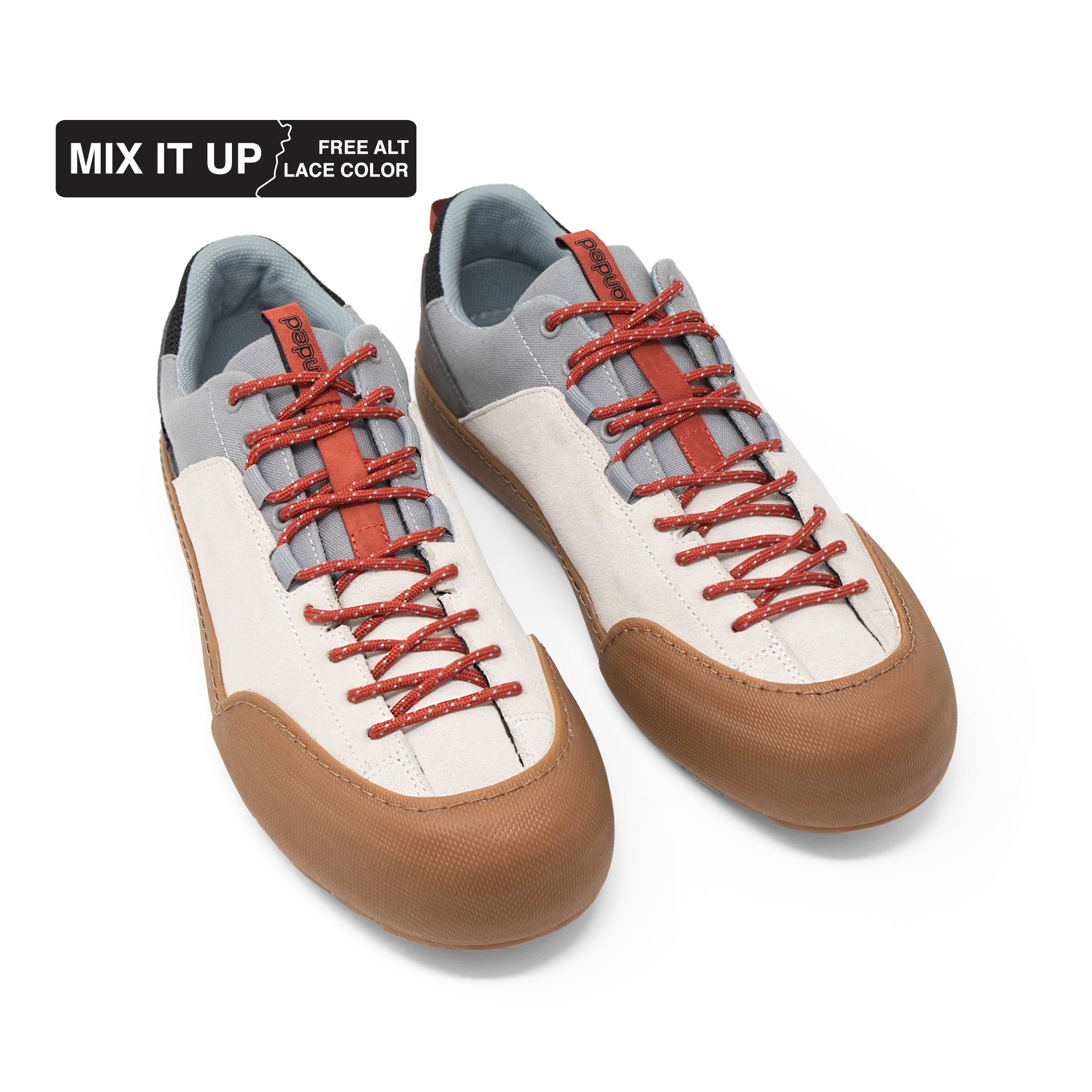 Landed The Switchback approach shoes in cream and grey suede with brown rubber toe caps and red patterned laces.